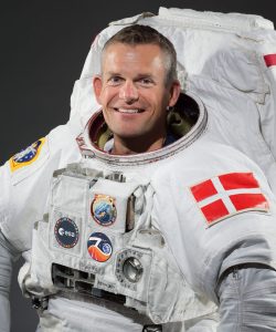 PHOTO DATE:  03-18-22
LOCATION:  Bldg. 8, Room 183 - Photo Studio
SUBJECT:  Photograph official astronaut portrait of ESA astronaut Andreas Mogensen in EMU.
PHOTOGRAPHER: BILL STAFFORD